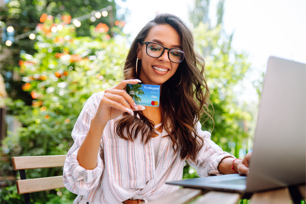 Woman shops online with the World Credit Card